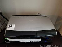 Top view of silver-and-black Bose media center