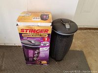 Used and new Stinger Ultra Insect Killers side by side, showing the used zapper unit and the new box.