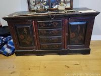 Full front view of sideboard on hardwood floor