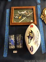 Framed photo featuring Ravens player Anquan Boldin (#80) making a catch over a Steelers defender (#38) with signature visible in lower right.