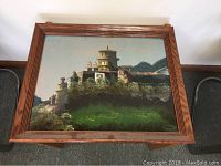 Overall view of the framed reverse painted glass showing Heidelberg Castle, capturing the composition and condition.