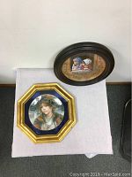 Top view of both plates showing frame styles and artwork.