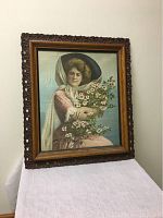 Front and angled view of the framed silk print showing the Victorian woman portrait with floral background and bouquets of flowers.