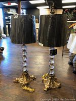 Full front view of both lamps with shades wrapped in plastic