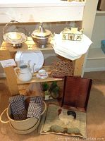 Photo showing the James Edwards & Son stone china tea/coffee pot, creamer, Woodbury pewter tureen, linens, and decorative items arranged on a wooden display shelf