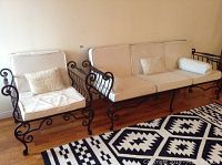 Three-seater sofa and single chair side by side