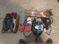 Overview of all items including planer, belt sander, grinders, saw