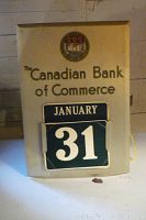 Front view of Canadian Bank of Commerce vintage perpetual calendar showing January 31 date with bank logo on top.