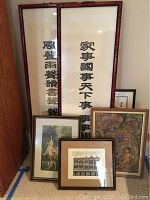 Full view of all six framed Asian art pieces grouped together showing size and framing styles