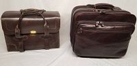 Two brown leather briefcase bags shown side by side, one with buckle straps and lock, the other with zippered compartments.