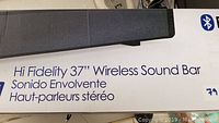 Close-up of the product name and size on the box indicating 'Hi Fidelity 37" Wireless Sound Bar'.