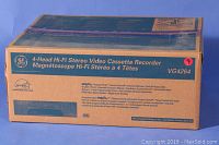 Original packaging box for GE VG4264 4-Head Hi-Fi Stereo Video Cassette Recorder showing branding and model.