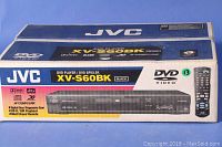 Original packaging of JVC XV-560BK DVD player showing box with model name and features