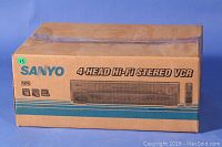 Original packaging box for Sanyo 4-Head Hi-Fi Stereo VCR showing branding and model details