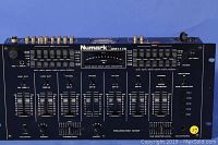 Front view of the Numark DM1175 DJ mixer showing all sliders, knobs, and level meters.