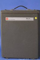 Closed hard plastic carrying case for Texas Instruments Silent 700 data terminal, showing branding and model.