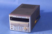 Front and angled view of TEAC CR-H130 showing compact size and disc changer slot.