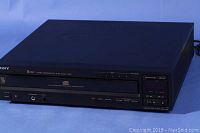 Sony CDP-505 5 Disc CD changer showing front with disc tray, control buttons, and headphone jack.