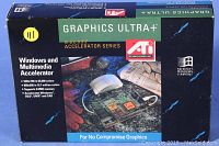 Photo of the retail box showing ATI Graphics Ultra+ mach32 graphics card accelerator series branding and specifications highlighting Windows and multimedia acceleration and supported resolutions.