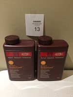 Front view of two bottles of DuPont StoneTech Professional Maximum BulletProof Sealer, side by side with caps closed, showing product labeling.