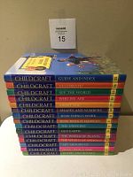 Stacked view showing the spines of all 15 Childcraft hardcover books with titles.