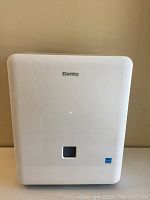 Front view of white Danby dehumidifier with model number and logo visible
