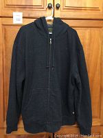 Full front view of the men's fleece lined hoodie, dark color with zip front and hood.
