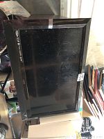 Front view of the Vizio 32-inch television showing the black frame and screen.