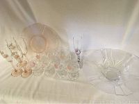 Photo showing entire set including painted stemware, clear glasses, decorative bowl and platter.