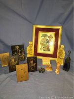 Showcases full array of Russian cultural and religious items including framed print, plaques, figurines, incense burner, and boxed sets