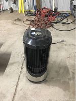 Front view of the Edgestar portable air conditioning unit showing black grille vents and silver body.