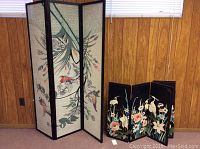 Full view of both room screens positioned near a wooden-paneled wall under windows