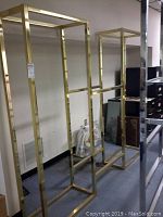 Front view of gold-tone metal frame sections