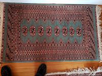 Pakistani green oriental area rug with multiple oval medallions and multi-layer borders, fringed edges