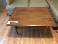 Front view showing overall table shape and top surface