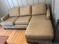 Front view of sectional sofa with chaise on the right