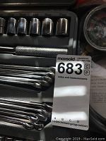 Close-up of the socket set and combination wrenches in metal case