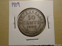 Obverse side of the 1909 Newfoundland 50 cents silver coin showing the denomination and year.