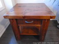 Front view showing drawer and lower shelf