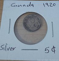 Front side of 1920 Canadian Silver Nickel showing King George V portrait and inscriptions.