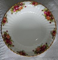 Top view of the Royal Albert Old Country Roses serving bowl showing the floral rose pattern with gold trim on scalloped edge.