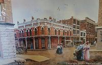 Photo showing the entire print with detailed historic streetscape of Victoria around 1900 featuring people in period dress and brick buildings.