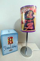 Full view of lamp with retro pin-up girl shade and packaging box with 50's Retro Lamp text