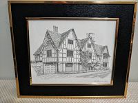 Framed signed black and white architectural print of a Tudor-style building titled 'Hall's Croft' by Anthony John with visible signature and matting.