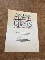 Photo of the Kingston Circus Arts aerial class pass showing logo, value, and contact information.