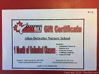 Photo of the printed gift certificate showing offer details and branding.