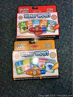 Two Water Wow! splash card sets, one alphabet, one shapes/colors/numbers, with refillable water pens