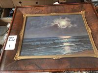 Full view of oil painting in shadow box frame