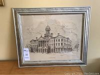 Framed print showing detailed architectural drawing of Victoria Hall Cobourg with visible sticker label.