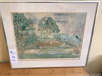 Framed serigraph momoprint titled Spring by Beatrice Sheppard, showing the full artwork and matting inside a silver frame.